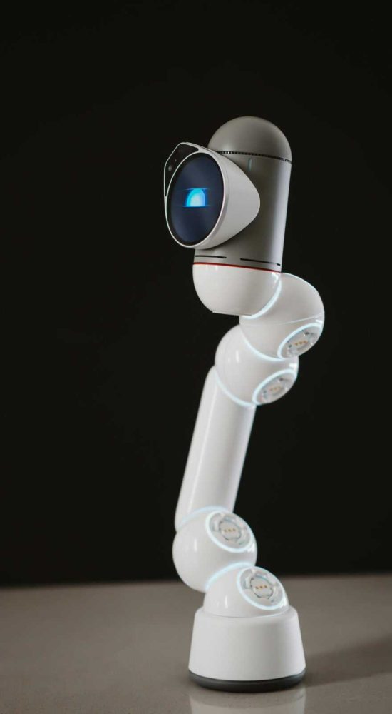 A sleek, futuristic robotic arm against a dark background showcasing modern technology.